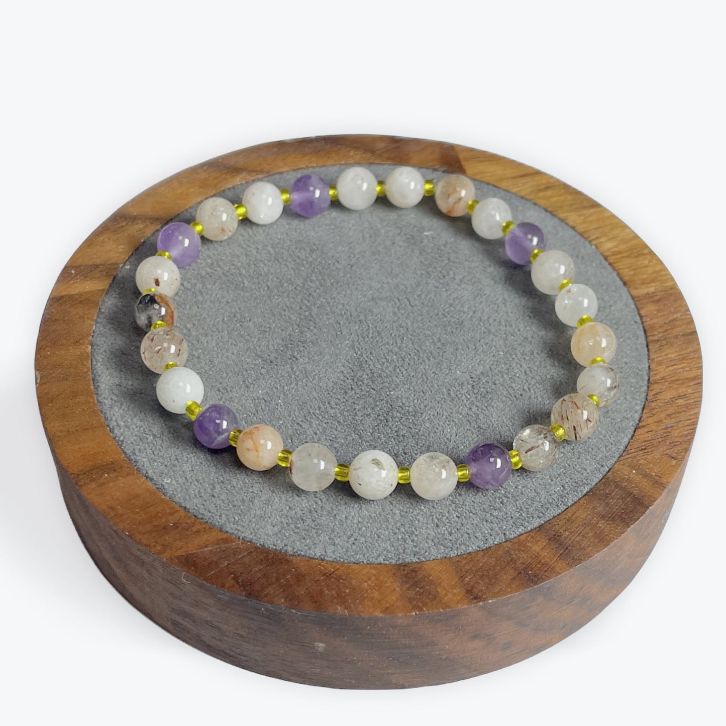 Bracelet Super Seven perles 6 mm avec décors dorée