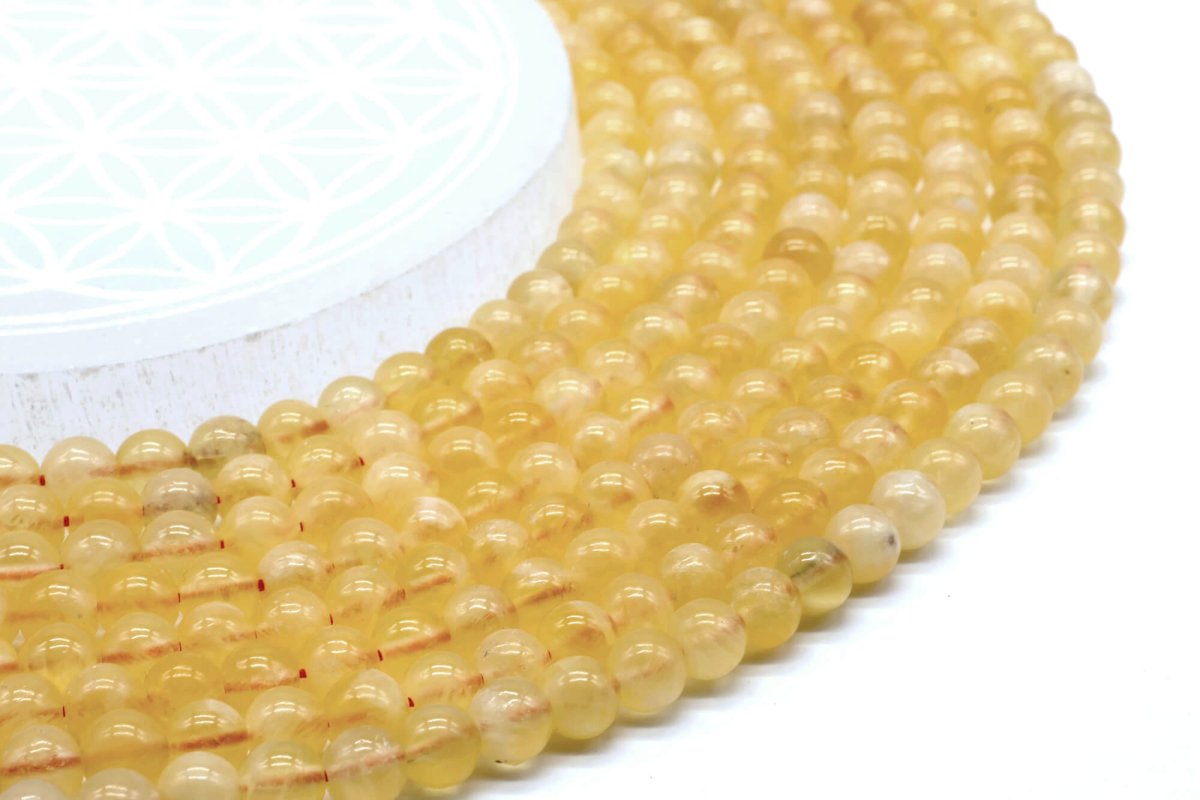 Perles Calcite Orange sur fil