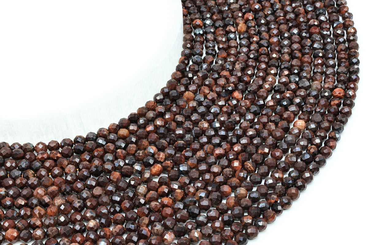 Fils de perles rondes facettées en Œil de Taureau brun rouge, disposés en arc