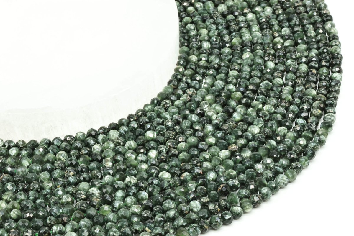 Perles facettées Séraphinite sur fil