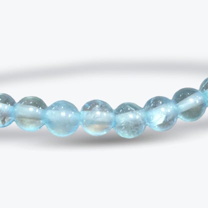 Bracelet en Topaze Bleue Naturelle – Perles rondes 4 mm – Fermoir élastique - Pièce unique
