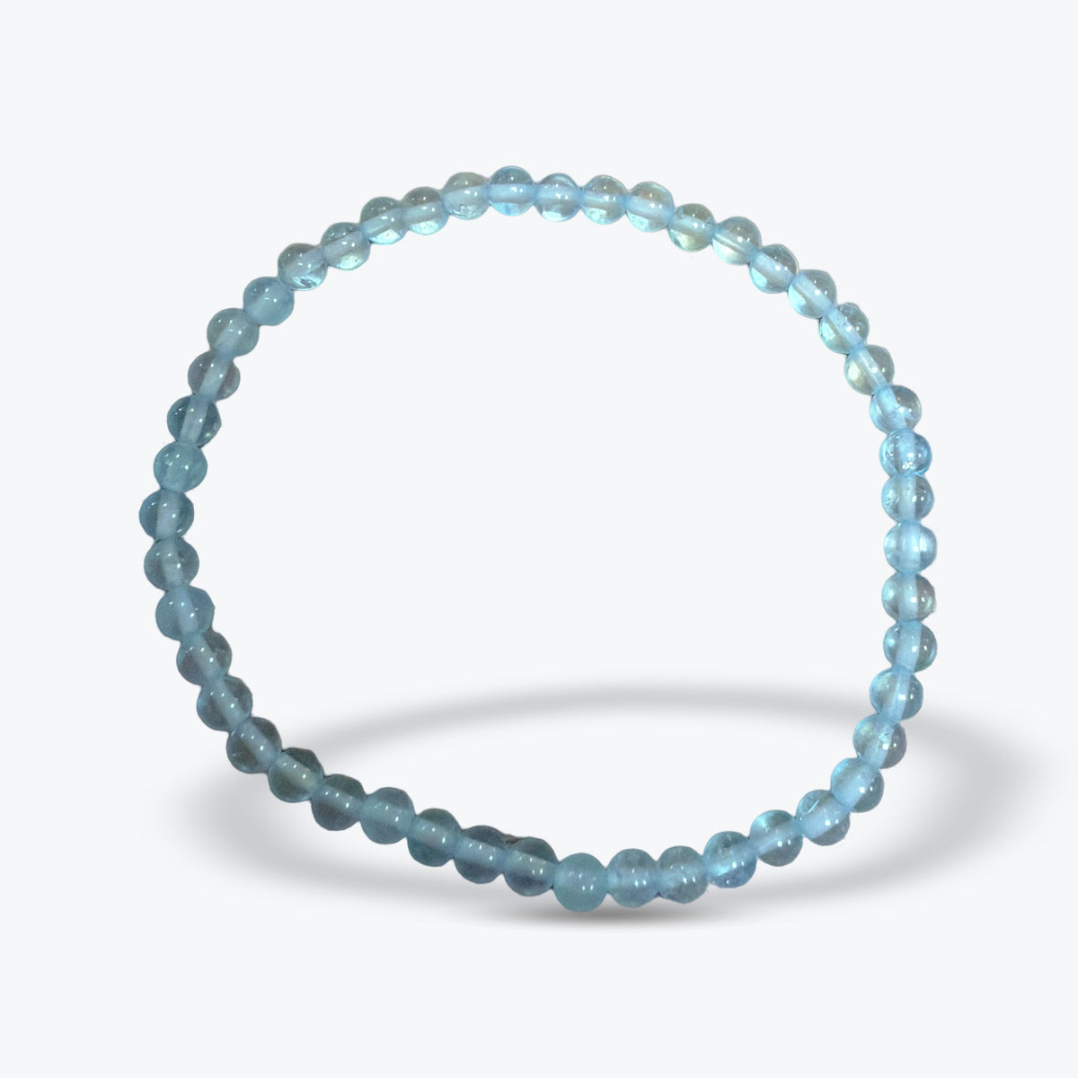 Bracelet en Topaze Bleue Naturelle – Perles rondes 4 mm – Fermoir élastique - Pièce unique