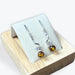 Boucle d'oreilles pendante torsadée en perle d'Ambre et Argent 925