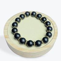 Bracelet Shungite 10 mm avec breloques dorée