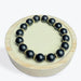 Bracelet Shungite 10 mm avec breloques dorée