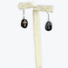 Boucle d'oreilles onyx avec croix