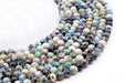 Perles Baryte 'AAA' sur fil