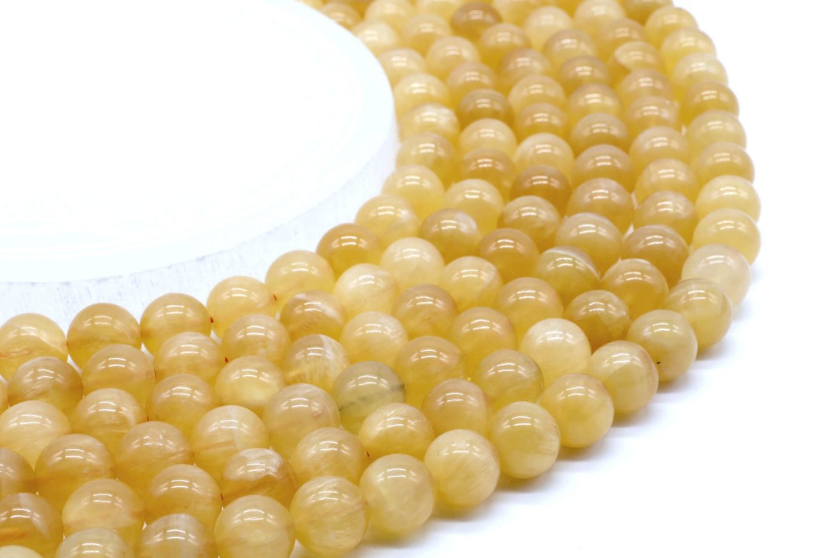 Perles Calcite Orange sur fil