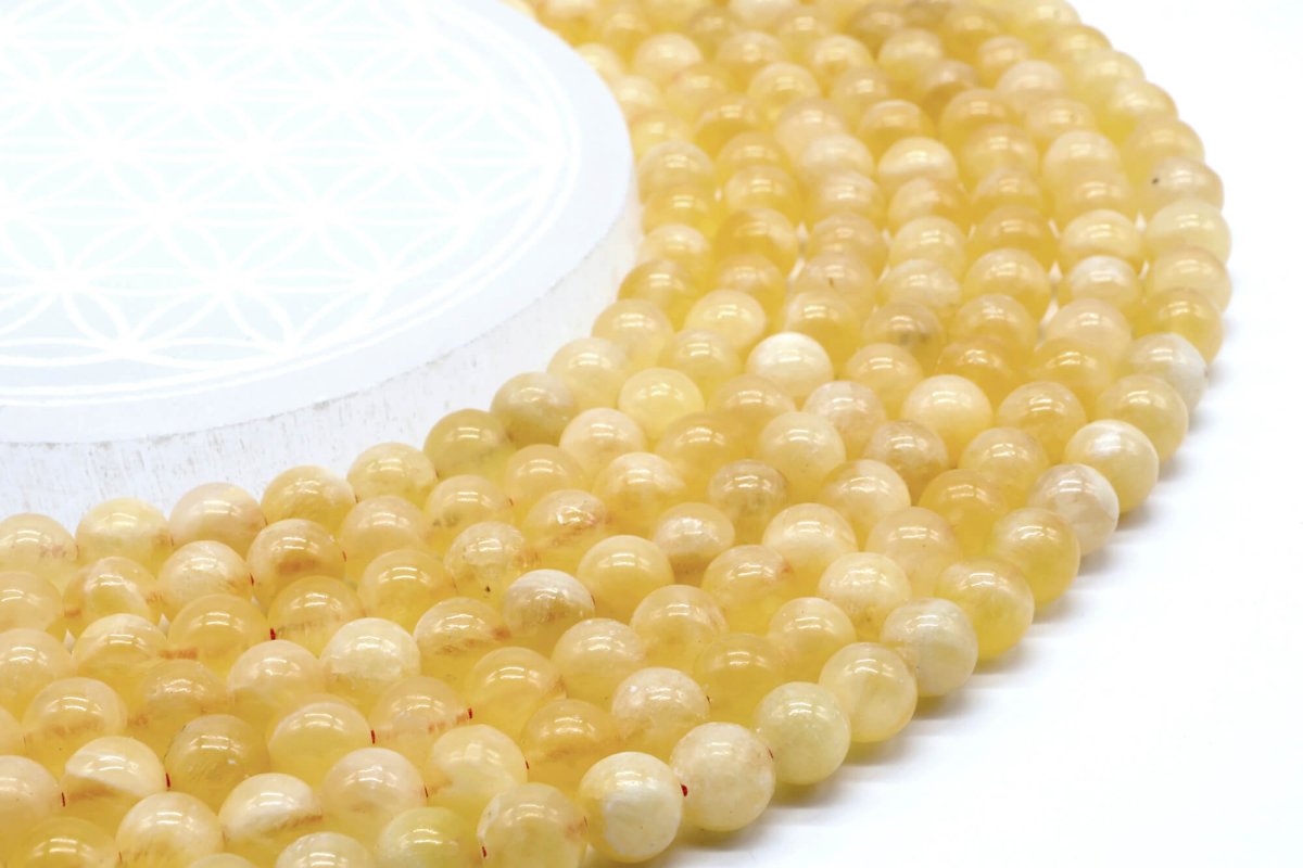 Perles Calcite Orange sur fil