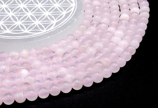 Perles Calcite Rose sur fil