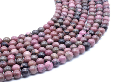 Perles 'Black Line' Rhodonite sur fil