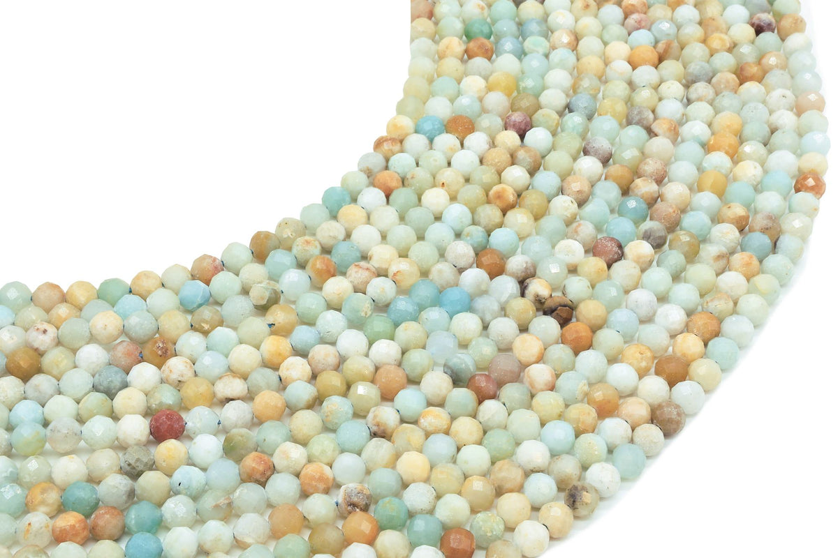 Fils de perles facettées d'Amazonite aux teintes bleu-vert, crème et ocre