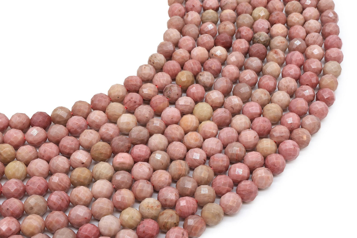 Fils de perles rondes facettées en Rhodonite rose et beige disposés en arc