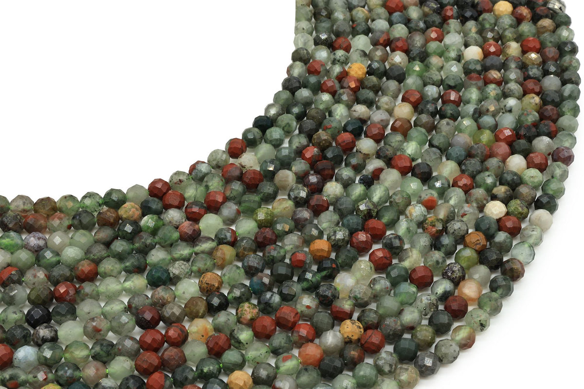 Fils de perles facettées de Jaspe Héliotrope aux tons verts et rouges, disposés en courbe