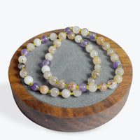 Bracelet Super Seven perles 6 mm avec décors dorée - 3
