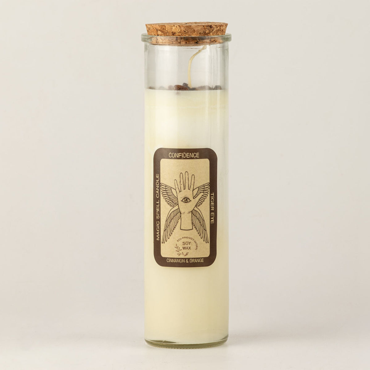 Bougie en cire de soja dans un pot en verre avec bouchon en liège et étiquette illustrée