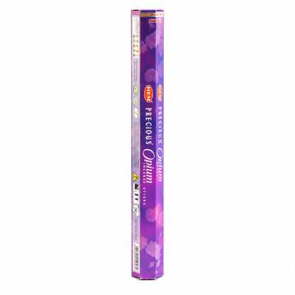 Boîte hexagonale violette d'encens HEM Précieux Opium posée debout sur fond blanc