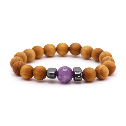 Bracelet élastique en perles de bois de cèdre avec perle centrale d'améthyste violette