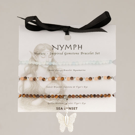 Trois bracelets aigue-marine, pierre de soleil et œil de tigre avec breloque papillon