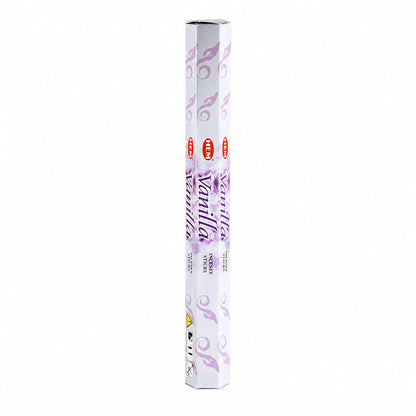 Boîte hexagonale blanche et mauve d'encens HEM parfum vanille posée debout