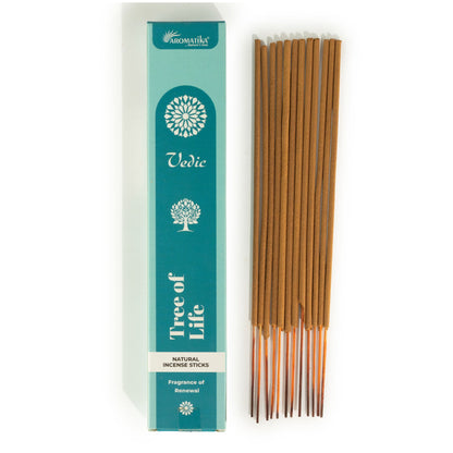 Boîte turquoise d'encens Vedic Arbre de Vie à côté de bâtonnets d'encens