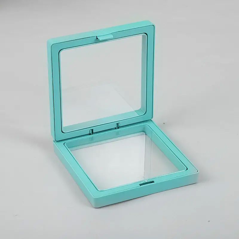 Cadre flottant 3D carré bleu sarcelle ouvert avec membranes transparentes