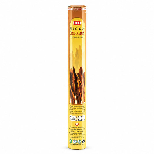 Étui hexagonal jaune d'encens HEM Precious Cinnamon avec bâtons de cannelle illustrés