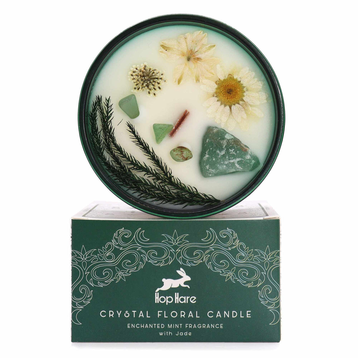 Bougie florale verte avec aventurine brute, éclats et fleurs séchées sur sa boîte