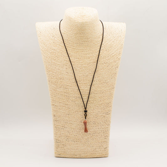 Pendentif sur cordon